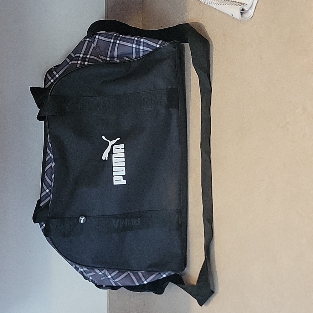 PUMA Duffle Bag black with grey/black/pink plaid accent